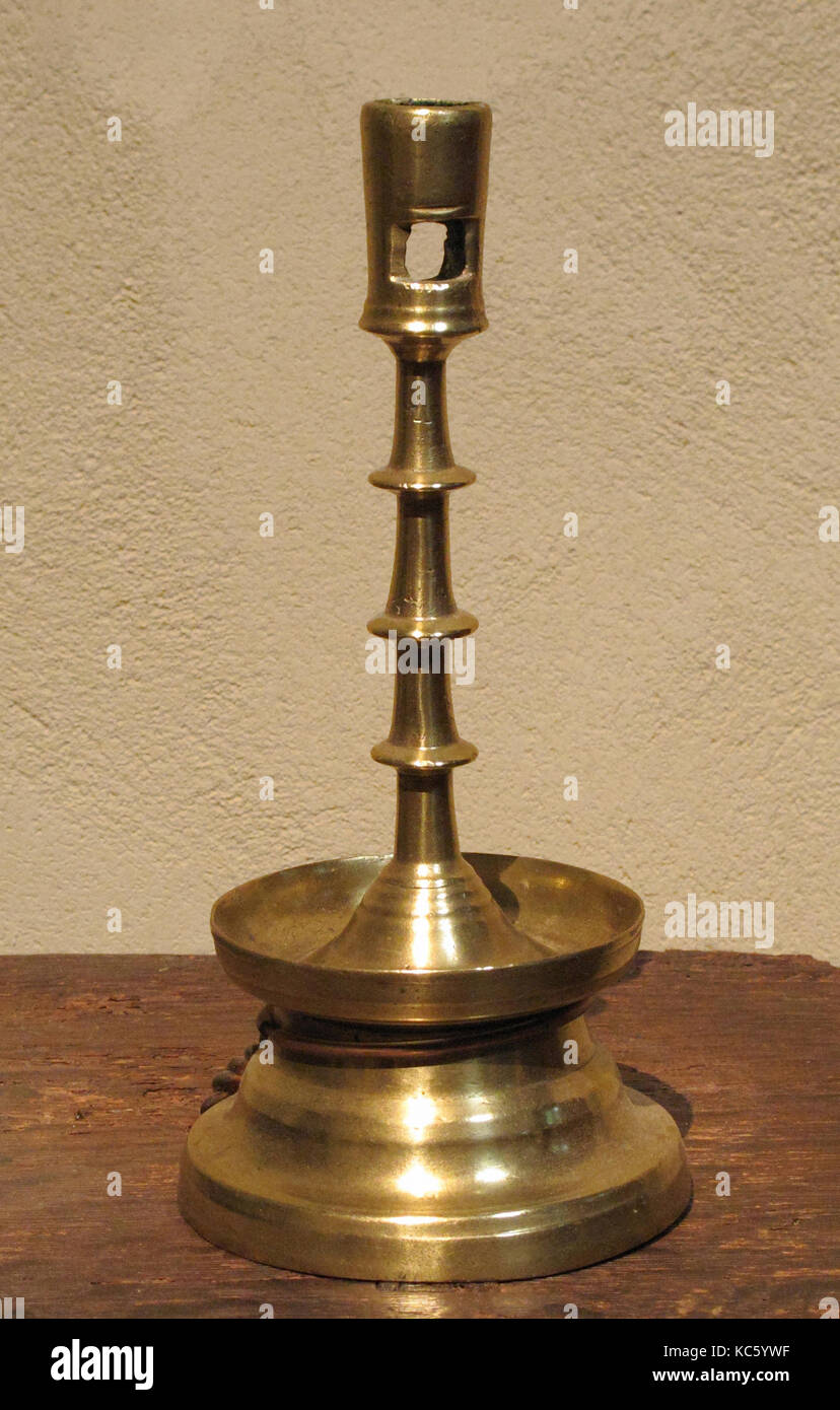 Candlestick, 15th century, German, Copper alloy, Overall: 9 1/4 x Diam. of base 4 1/4 in. (23.5 x 10.8 cm), Metalwork-Bronze Stock Photo