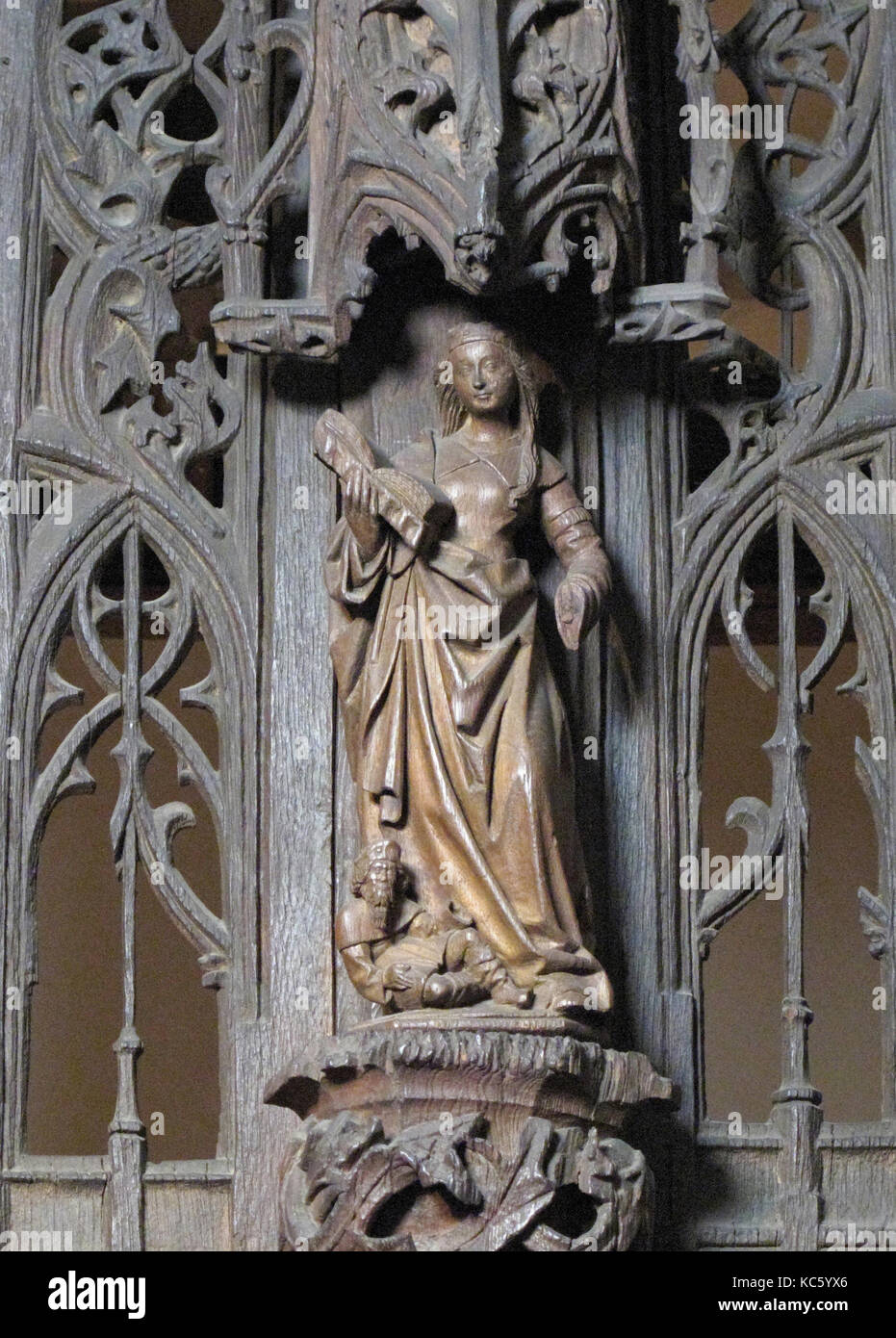 Saint Catherine, ca. 1500, North French, Walnut, Overall: 13 7/16 in. (34.2 cm), Sculpture-Wood Stock Photo