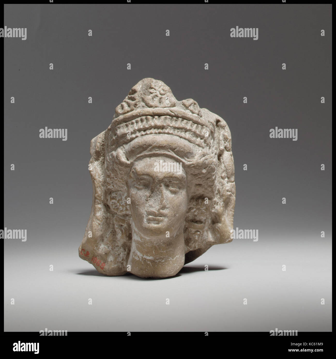 Terracotta head of a goddess, Cypro-Classical II, 4th century B.C., Greek, Cypriot, Terracotta; mold-made and handmade, H. 3 9/1 Stock Photo