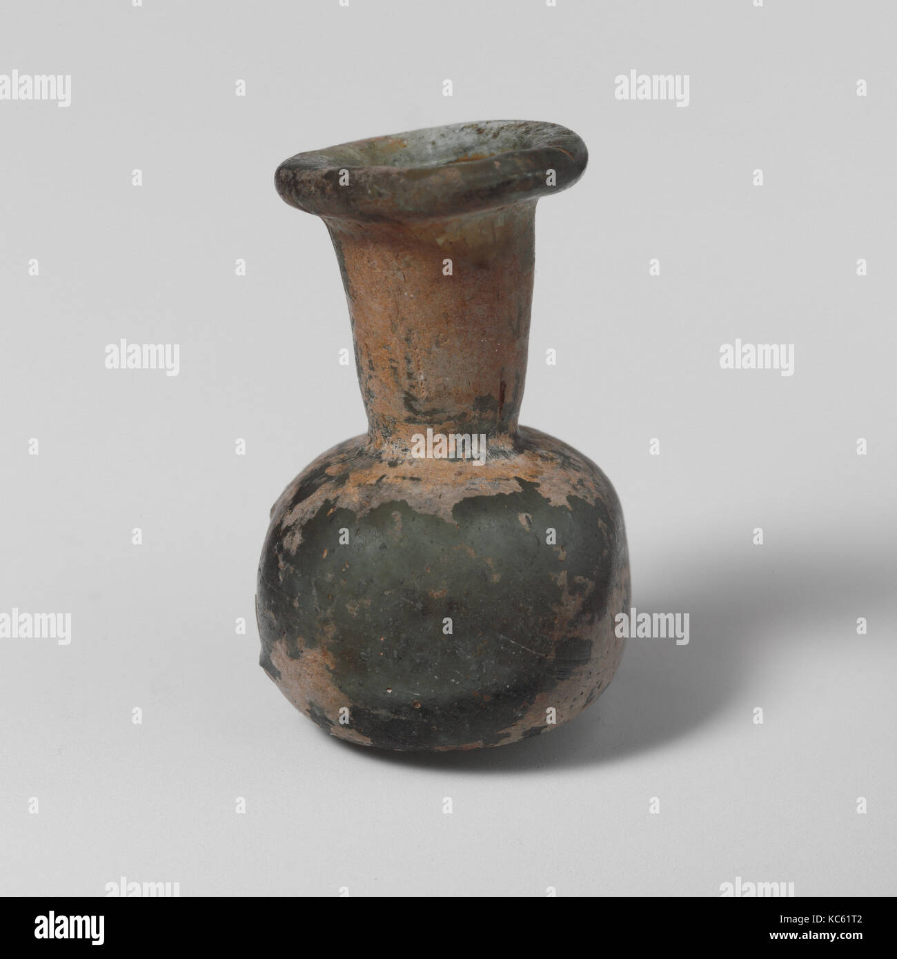 Glass perfume bottle, Mid Imperial, 2nd–3rd century A.D., Roman, Glass; blown, 1 3/8 x 7/8in. (3.5 x 2.2cm), Glass, Small Stock Photo