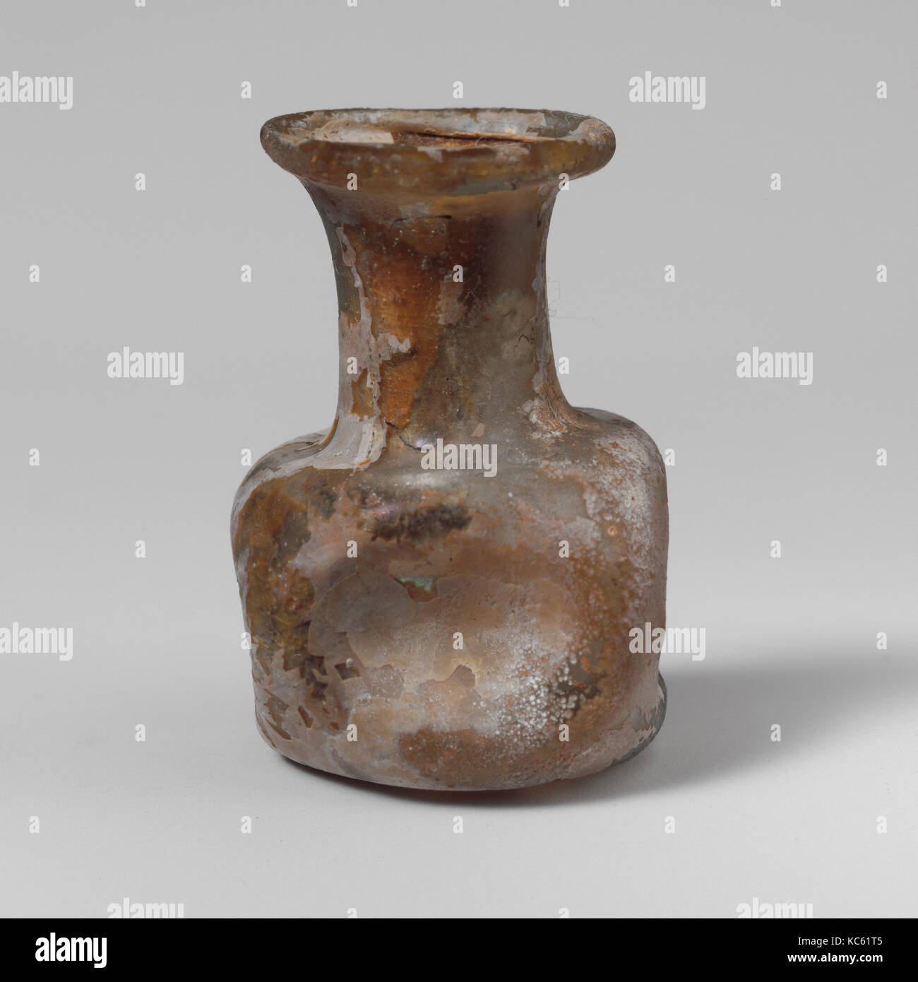 Glass perfume bottle, Mid Imperial, 2nd–3rd century A.D., Roman, Glass; blown and tooled, 1 1/2 x 1 1/16in. (3.8 x 2.6cm), Glass Stock Photo