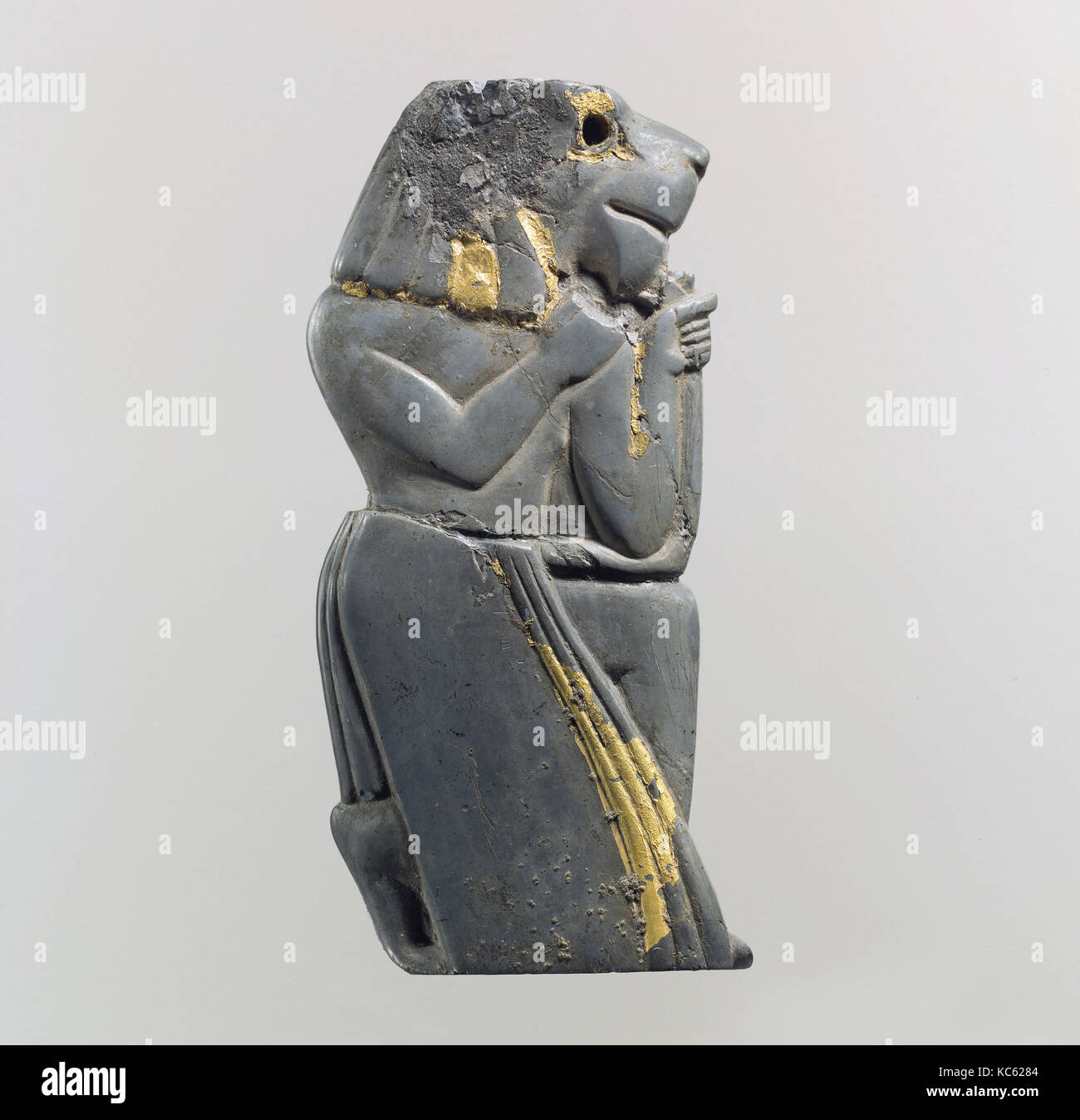 Kneeling lion headed figure hi-res stock photography and images - Alamy