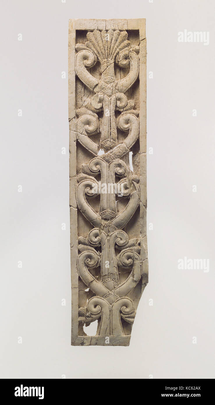Furniture plaque carved in relief with volutes and palmette, ca. 8th century B.C Stock Photo