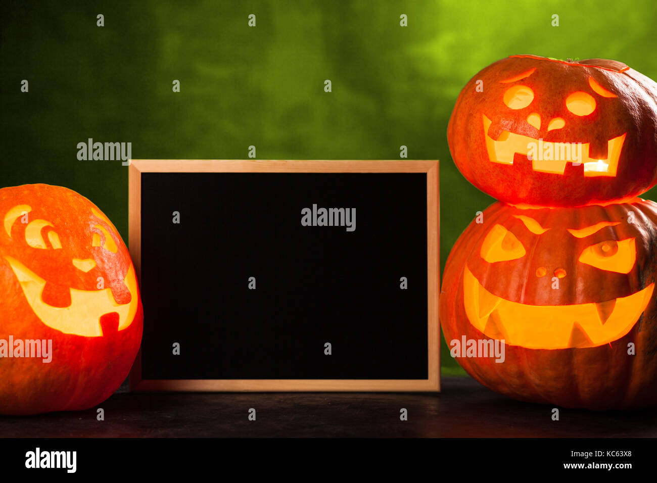 Three halloween Jack O' Lantern pumpkins Stock Photo Alamy