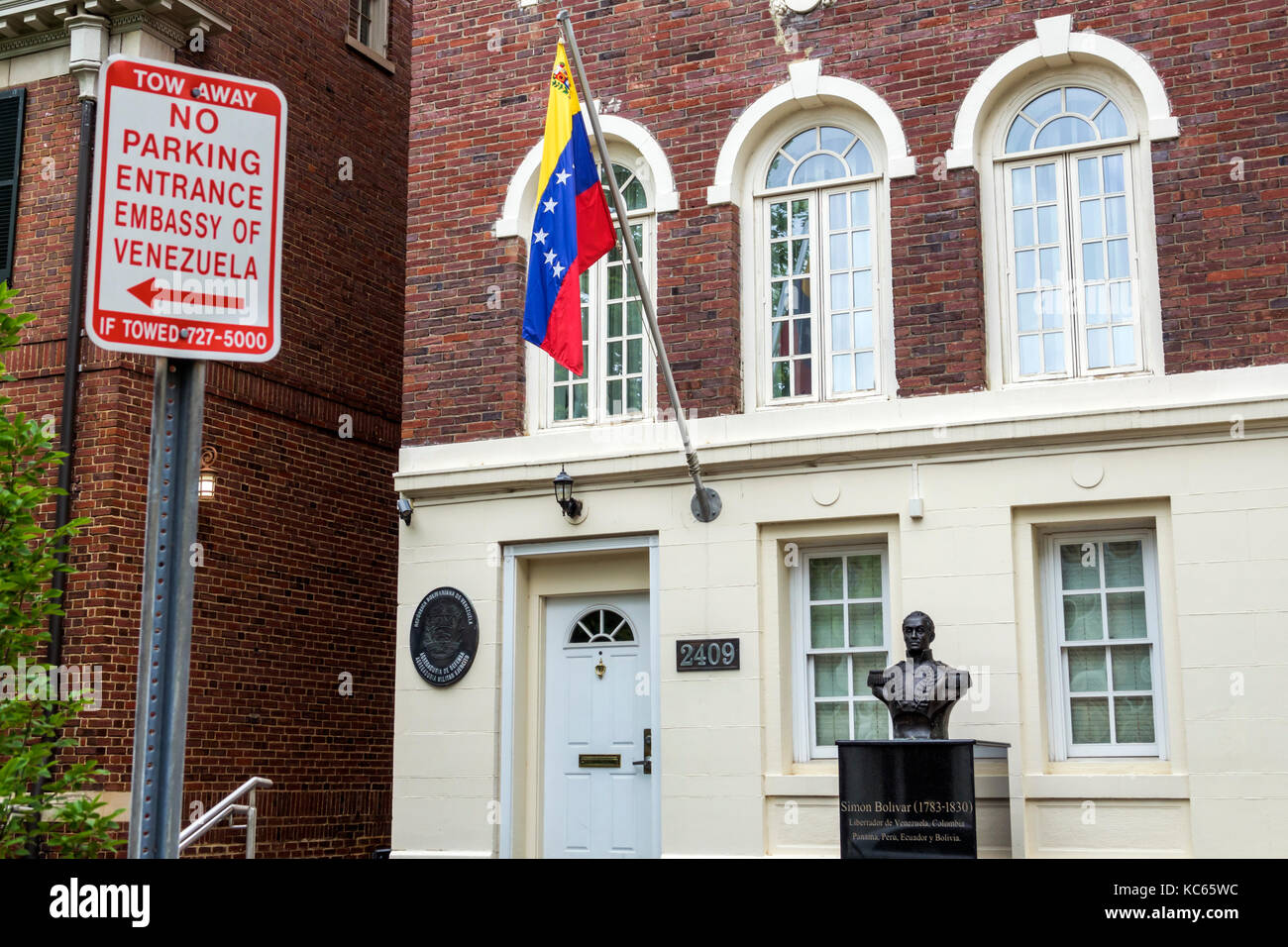Washington DC,Kalorama Heights,Embassy Row,diplomatic building,Embassy of Venezuela,restricted parking,sign,Simon Bolivar,statue,flag,DC170525053 Stock Photo
