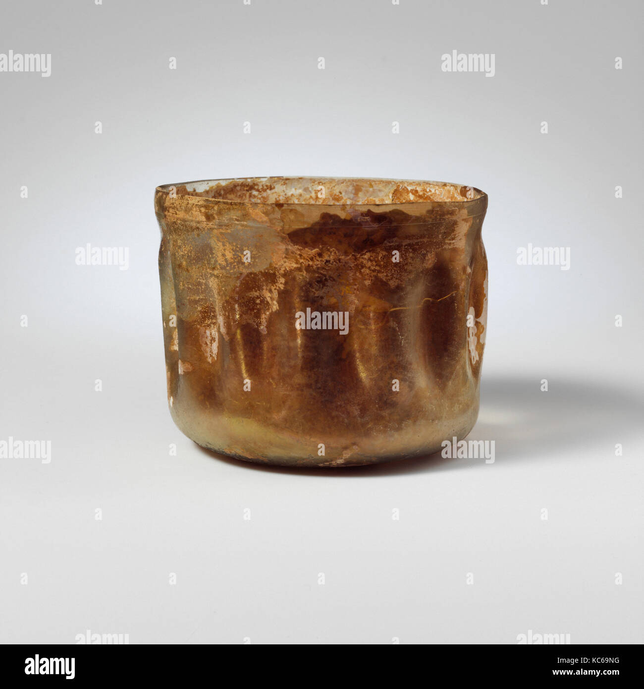 Glass cup with indented sides, 1st–2nd century A.D Stock Photo