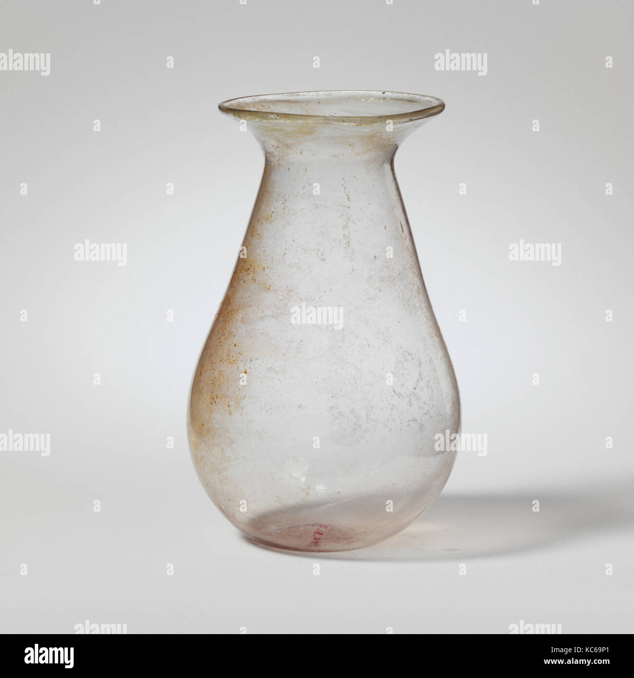 Glass jar, Mid Imperial, 2nd–3rd century A.D., Roman, Glass; blown, Height: 4 7/16 in. (11.3 cm), Glass, Colorless with slight Stock Photo