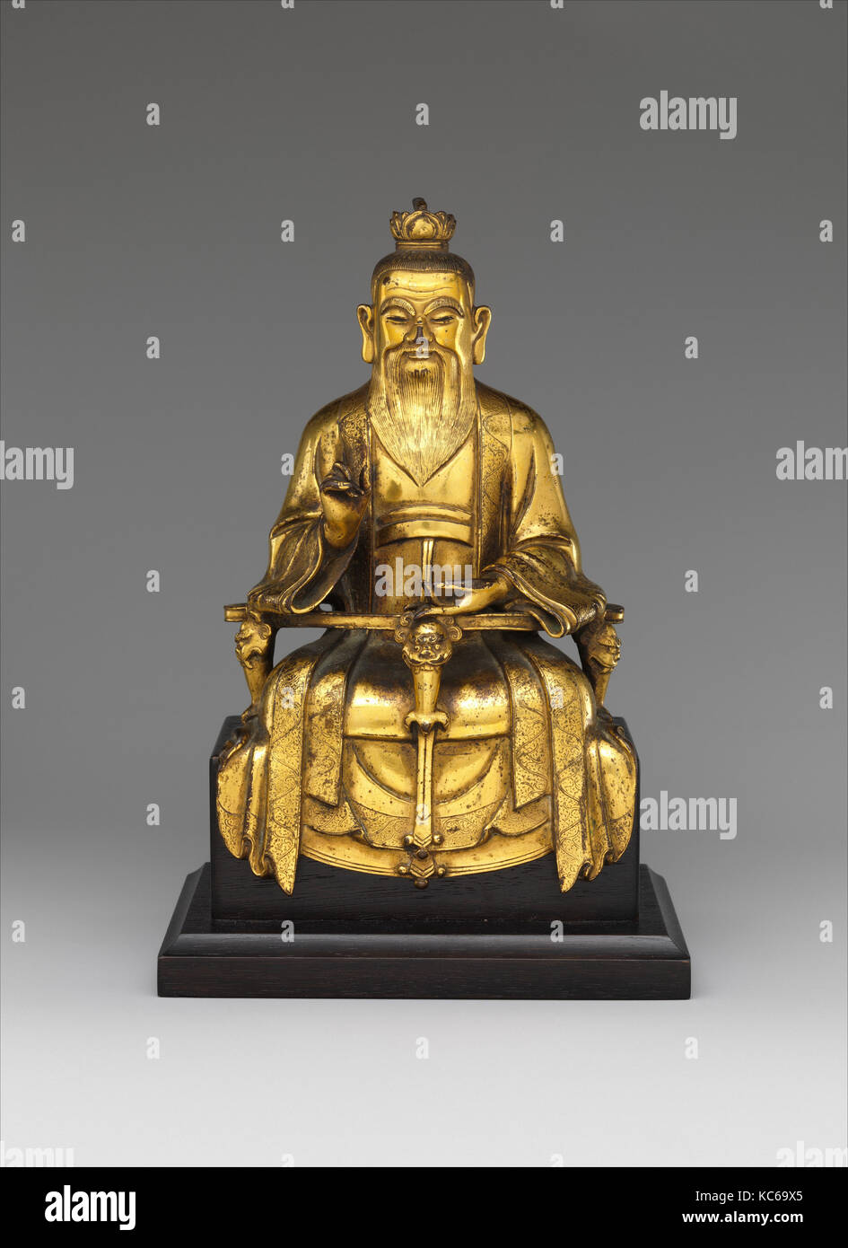 Daoist Immortal Laozi, Ming dynasty (1368–1644), dated 1438, China, Gilt brass; lost-wax cast, H. 7 1/2 in. (19 cm); W. 4 3/4 Stock Photo