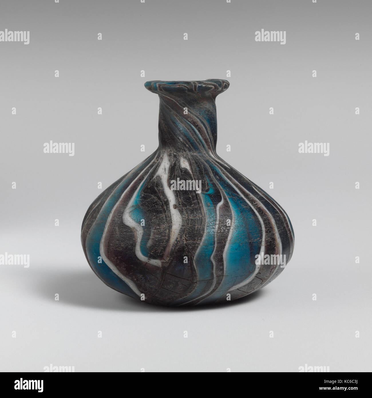 Glass mosaic perfume bottle, 1st half of 1st century A.D Stock Photo