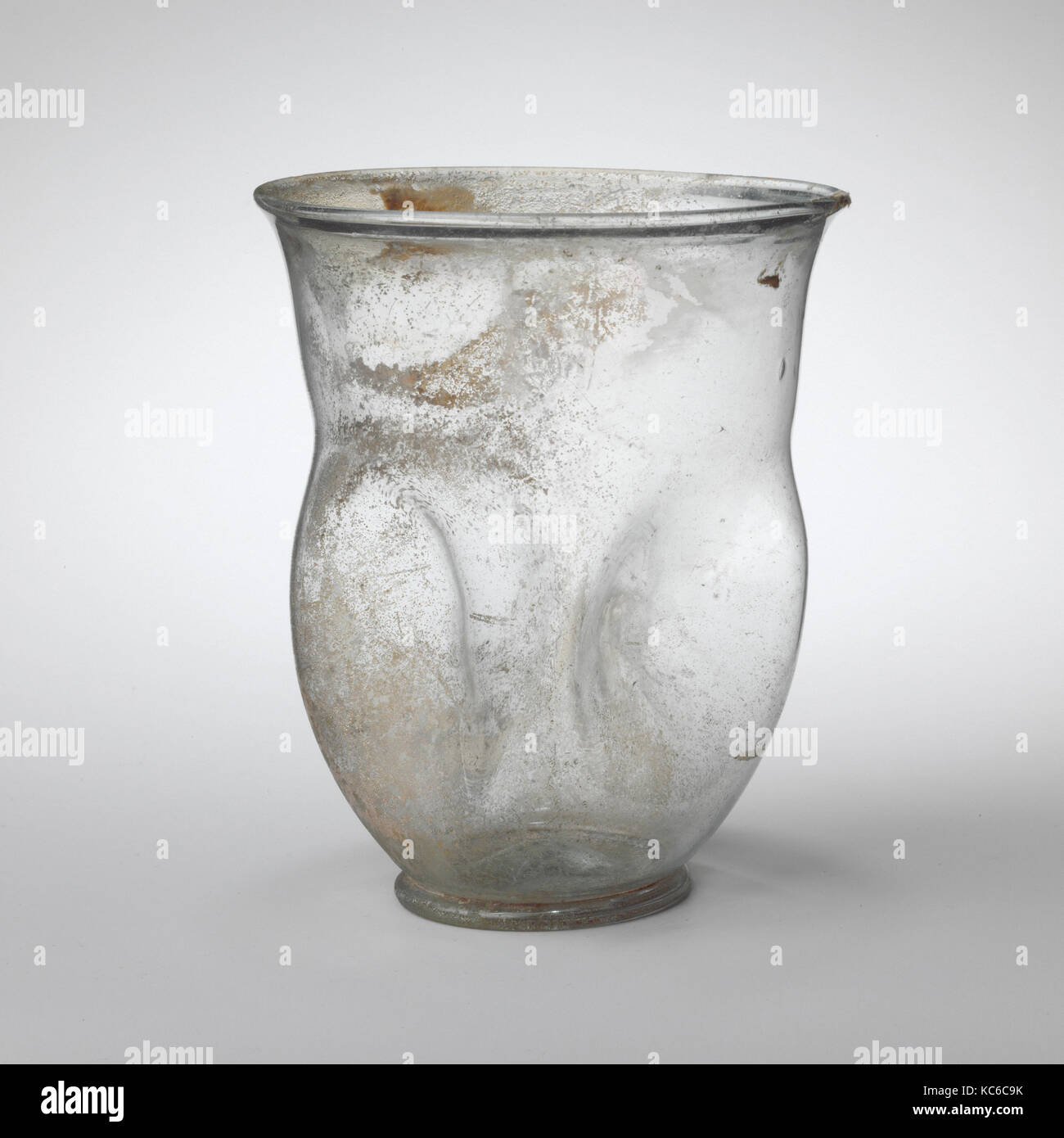 Glass beaker with indented sides, 2nd–3rd century A.D Stock Photo