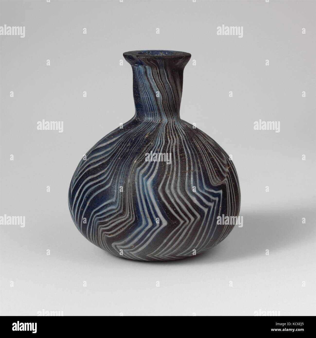 Glass mosaic bottle, Early Imperial, Julio-Claudian, 1st half of 1st century A.D., Roman, Glass; cast and blown, and tooled, 2 7 Stock Photo
