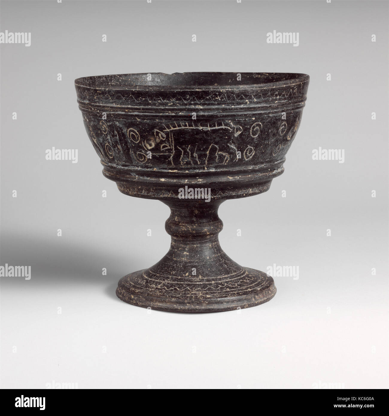 Terracotta chalice, Archaic, ca. 550–525 B.C., Etruscan, Terracotta; bucchero, Other: 5 3/16 x 5 9/16 in. (13.2 x 14.1 cm), Vase Stock Photo