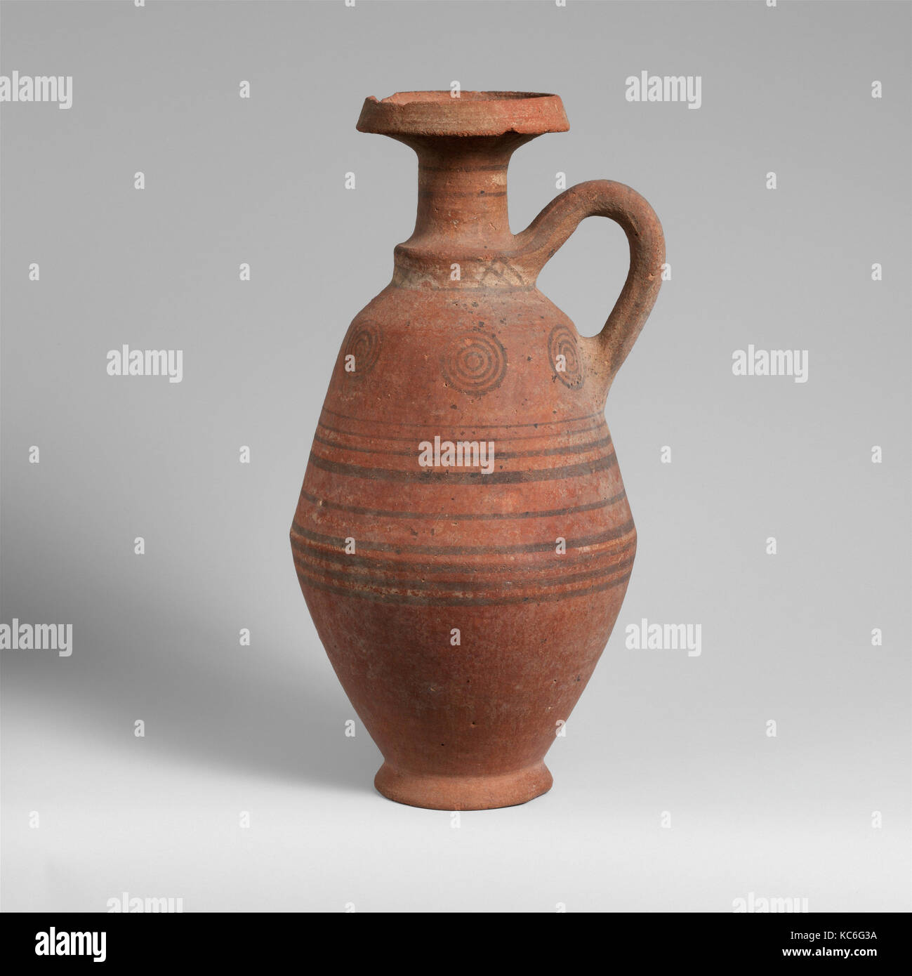 Terracotta jug, Cypro-Archaic II, 600–480 B.C., Cypriot, Terracotta, H. 10 5/8 in. (27 cm), Vases, Jug with one handle, moulded Stock Photo