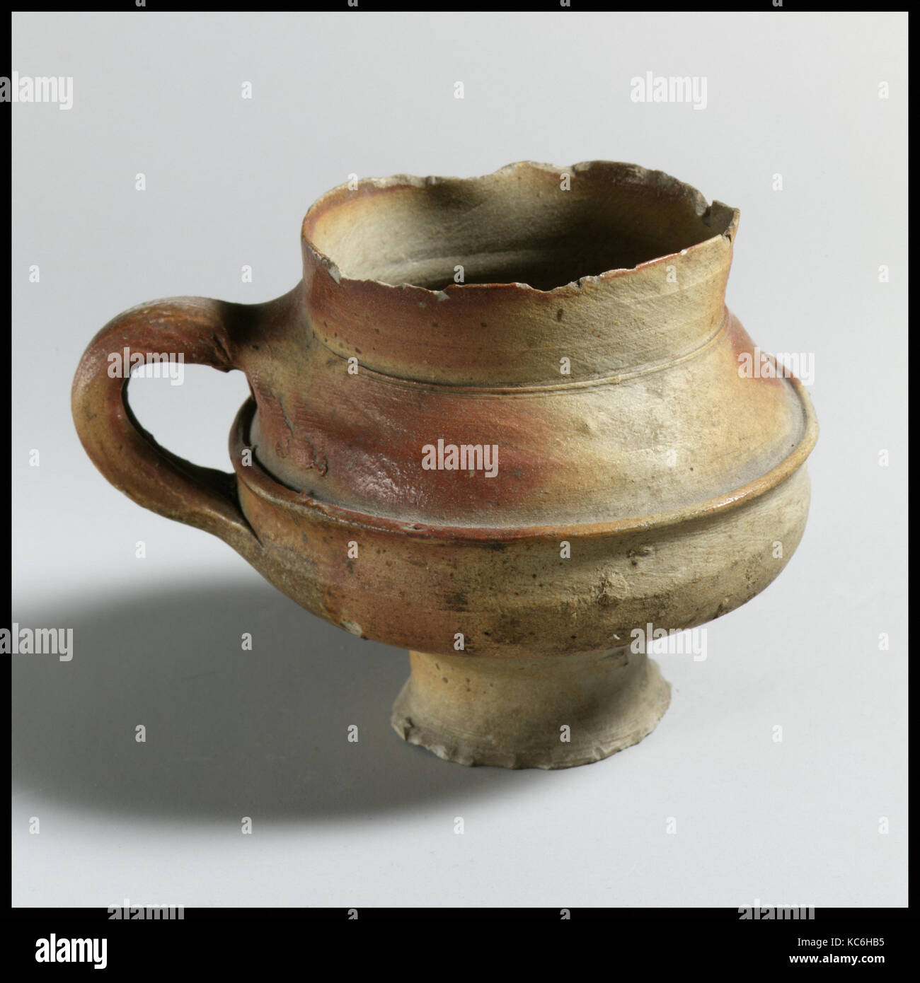 Jug, Roman, Terracotta, H. 6.91 cm., Vases, One-handled jug with traces of greenish glaze Stock Photo