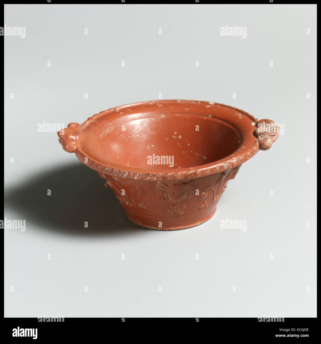 Terracotta cup, Imperial, Flavian–Early Antonine, ca. A.D. 70–150, Roman, Terracotta; Italian sigillata ware, H. 1 11/16 in. (4 Stock Photo