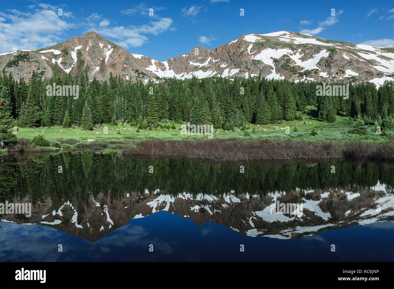 Mountains reflected on beaver pond, Meadow Creek Trail to Eccles Pass