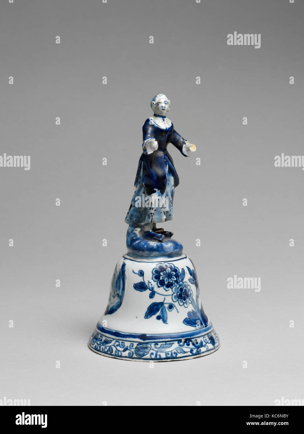 Handbell, ca. 1770, Delft, Netherlands, Dutch, Ceramic, wood, H. 1311 cm (5 3/16 in.) x Diam. 7 cm (2 3/4 in.), Wt. 100 g Stock Photo