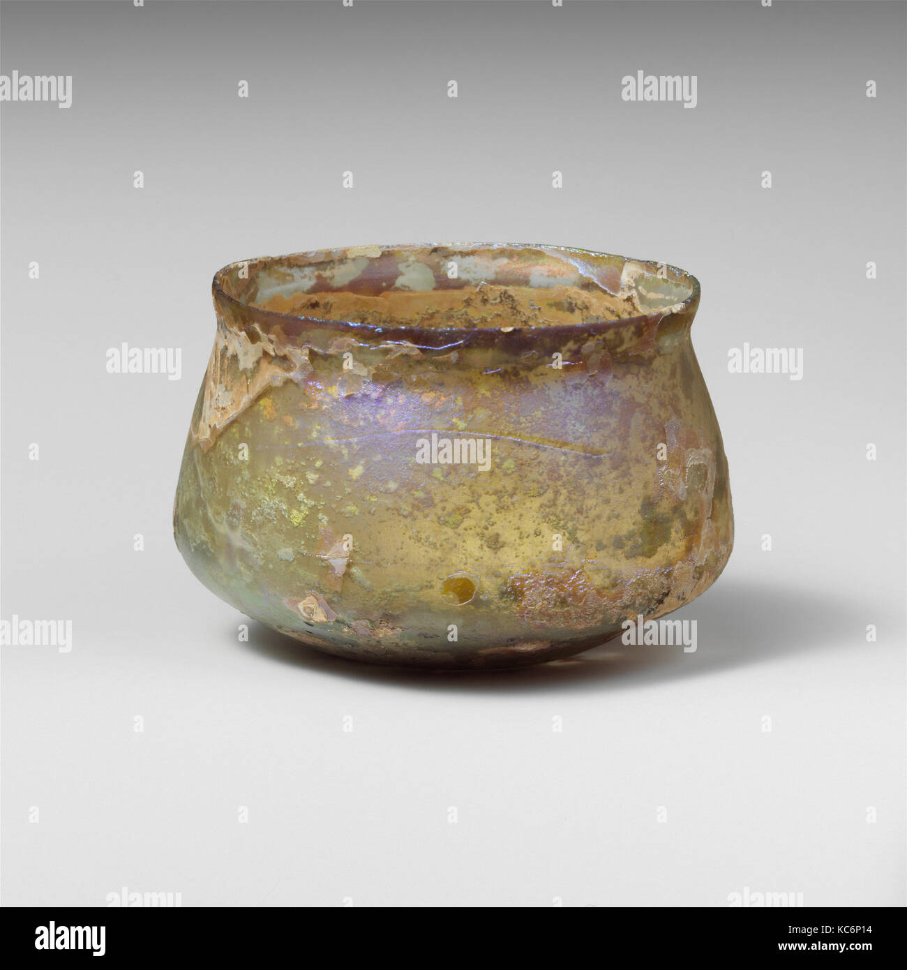 Glass cup, Mid Imperial, 2nd–3rd century A.D., Roman, Glass; blown and cut, Height: 2 3/8in. (6.1cm), Glass Stock Photo