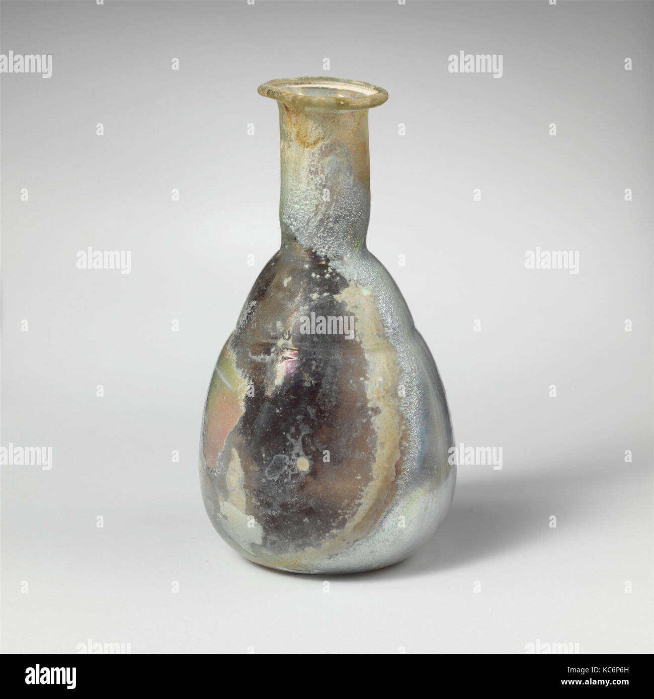 Glass perfume bottle, Early Imperial, 1st century A.D., Roman, Glass; blown and cut, Overall: 3 1/8 in. (7.9 cm), Glass Stock Photo