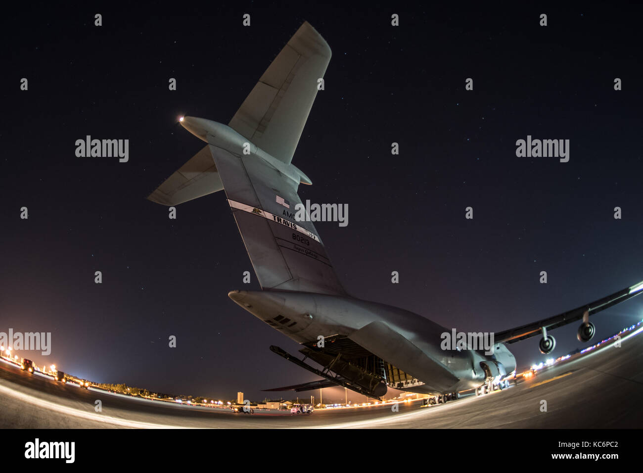 Loading 5,000-pound Federal Aviation Administration power generator on a C-5 Super Galaxy. Stock Photo