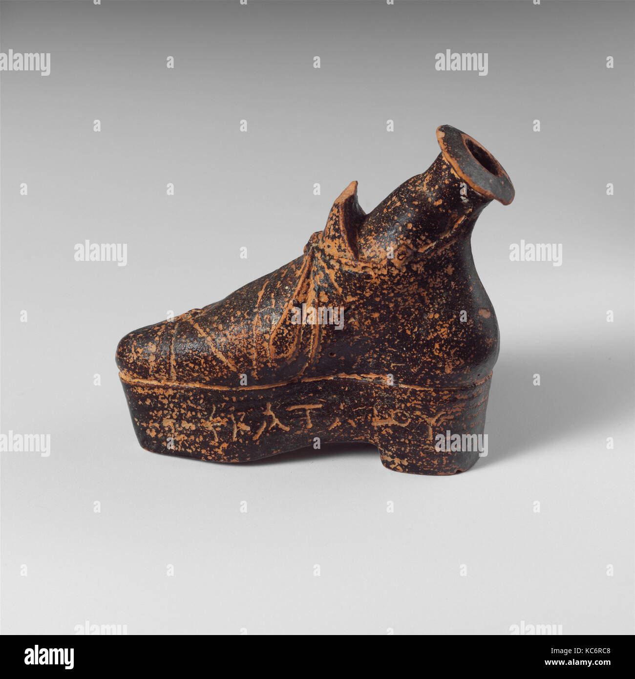 Terracotta perfume flask in the shape of a shoe 1st century B.C