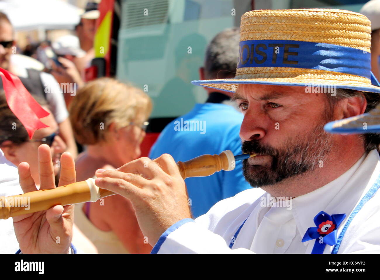 Oboe player in the traditional French band "Los Marineros" marching at