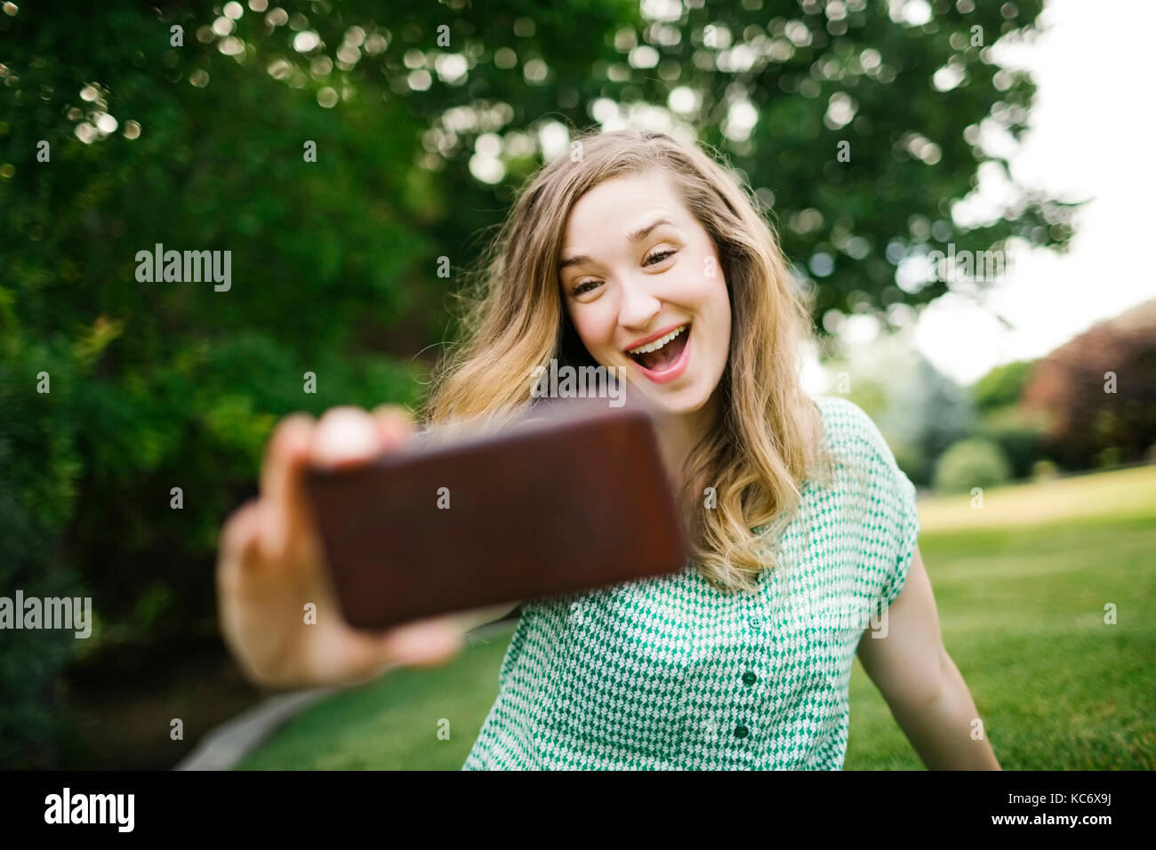 Beautiful woman taking selfie Stock Photo
