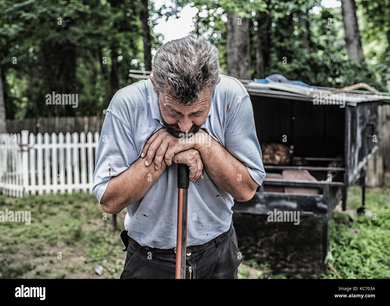 Man working by traditional Bosnian cook hut in backyard Stock Photo - Alamy