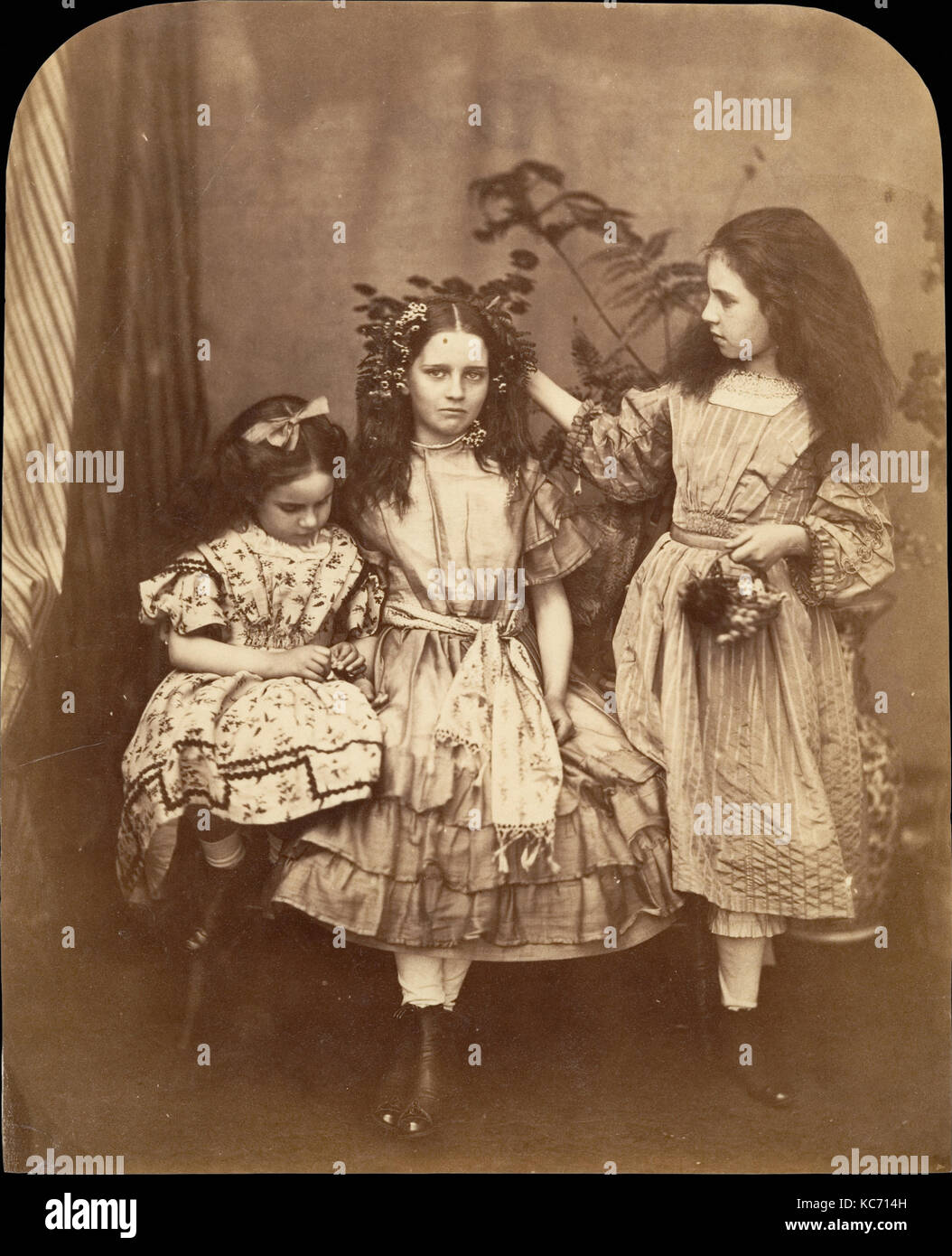 Flora Rankin, Irene MacDonald, and Mary Josephine MacDonald at Elm Lodge, Lewis Carroll, July 1863 Stock Photo