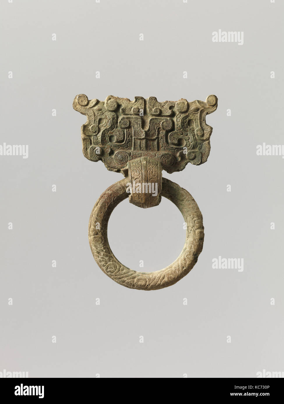 Ring Handle with Mask, Western Zhou dynasty (1046–771 B.C.), China, Bronze, H. 3 7/16 in. (8.7 cm); W. 2 1/2 in. (6.4 cm Stock Photo