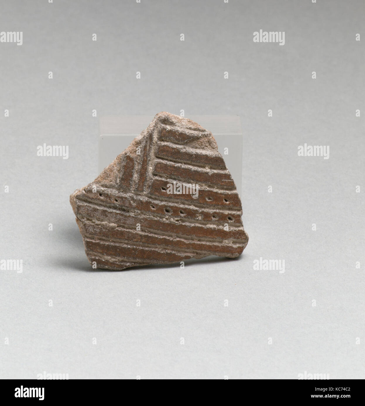 Terracotta vessel fragment with incised lines and punctations, ca. 3600 ...