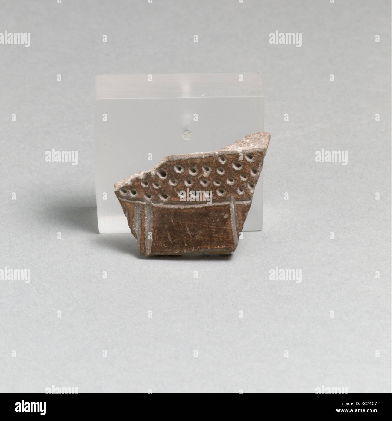 Terracotta vessel fragment with incised lines and punctations, ca. 3600 ...