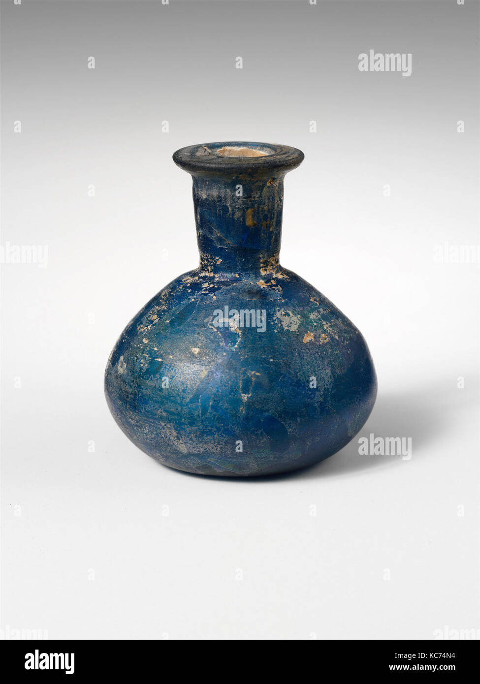 Glass perfume bottle, Early Imperial, Julio-Claudian, 1st half of 1st century A.D., Roman, Glass; cast and blown, H.: 2 5/16 in Stock Photo