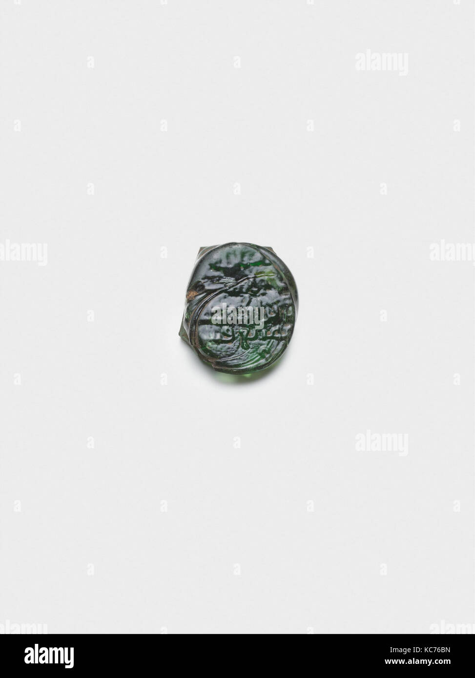 Vessel Stamp, 743–49, Attributed to Egypt, Glass, L. 1 3/8 in. (3.5 cm), Glass Stock Photo