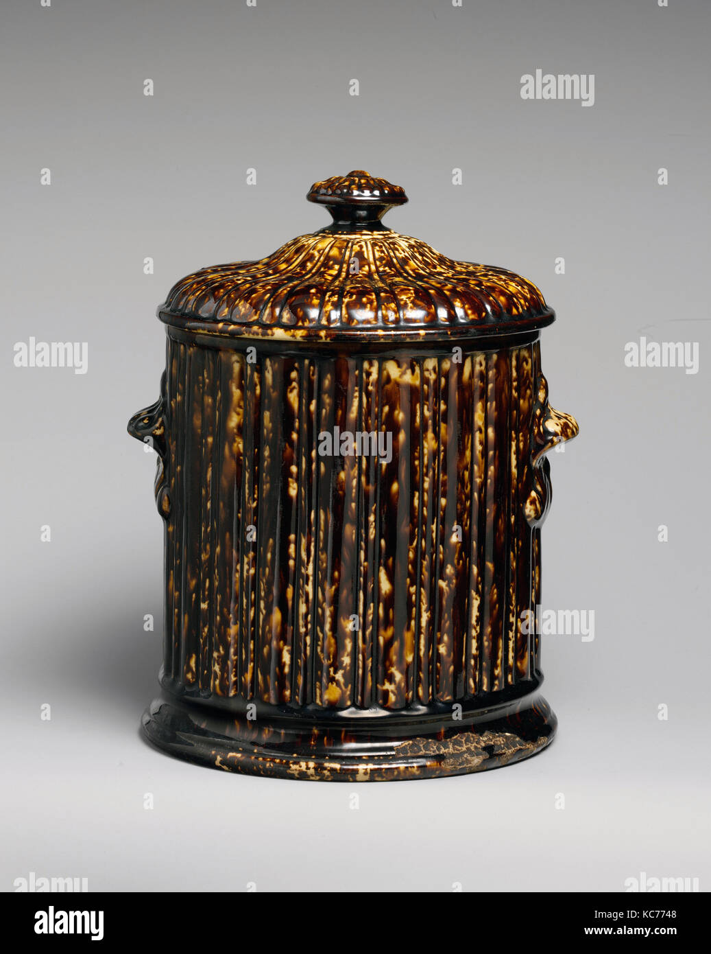Covered Tobacco Jar, 1849–58, Made in Bennington, Vermont, United States,  American, Mottled brown earthenware, H. 10 1/4 in. (26 Stock Photo