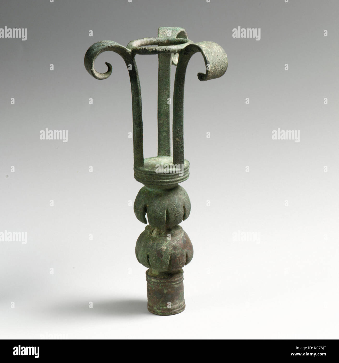Bronze lampstand, Cypro-Archaic, 6th century B.C., Cypriot, Bronze, H.: 8 in. (20.3 cm), Bronzes, Short stem decorated with two Stock Photo