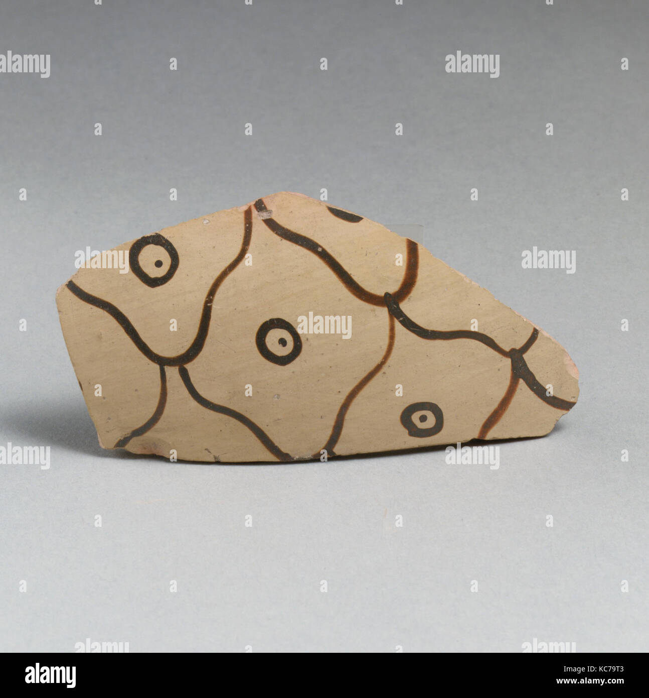 Terracotta vessel fragment with net pattern and dots within circles, ca ...