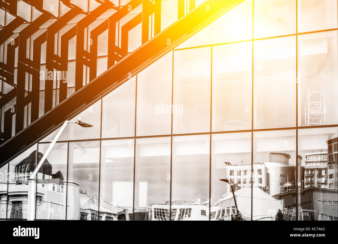 Modern office building close up in sunlight Stock Photo - Alamy