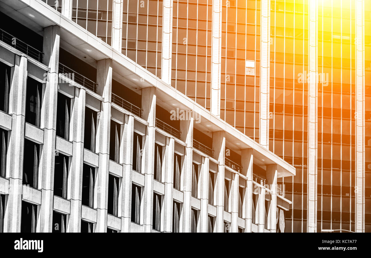 Modern office building close up in sunlight Stock Photo - Alamy