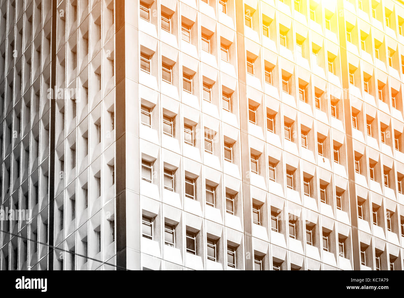 Modern office building close up in sunlight Stock Photo - Alamy