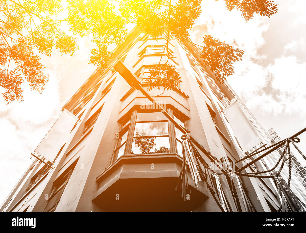 Modern office building close up in sunlight Stock Photo - Alamy