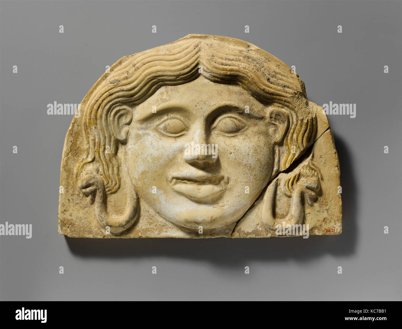 Terracotta gorgoneion antefix (roof tile), 2nd half of the 5th century B.C Stock Photo