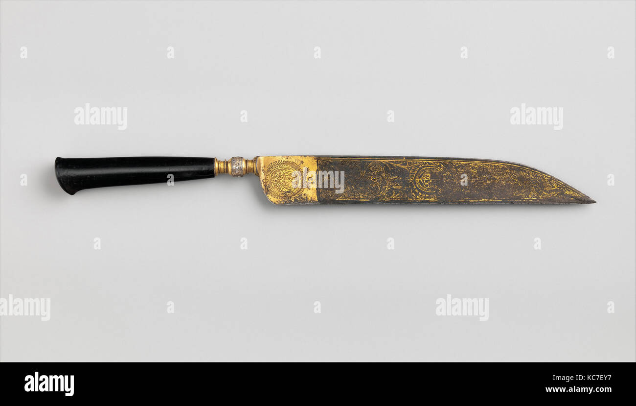 Knife, 17th century, Italian, Steel, wood (ebony), gold, L. 11 9/16 in. (29.3 cm); L. of blade 7 1/4 in. (18.4 cm); W. 1 1/16 Stock Photo