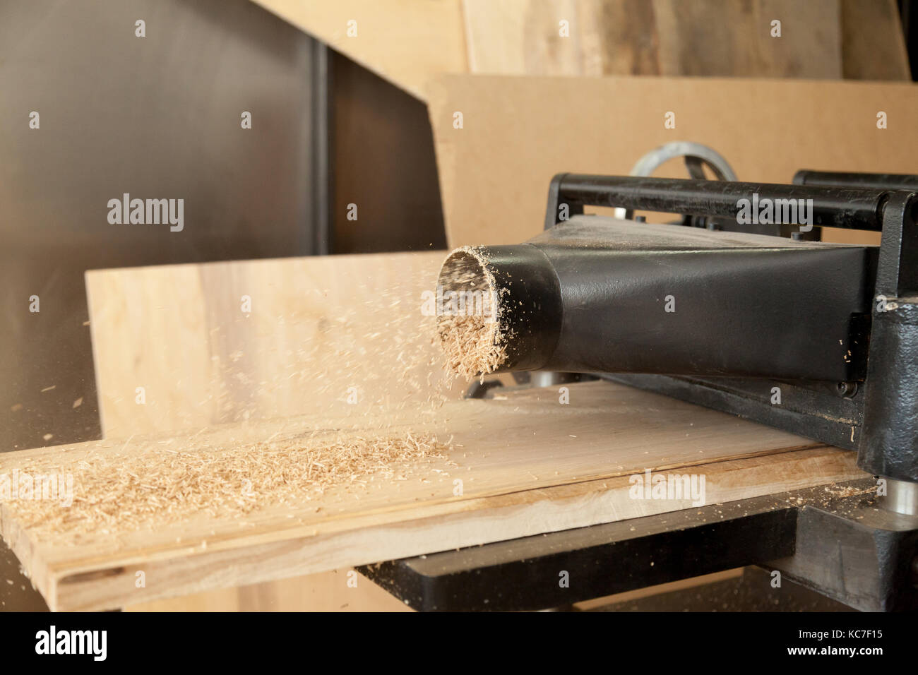 Planer machine reduce wooden board thickness Stock Photo Alamy