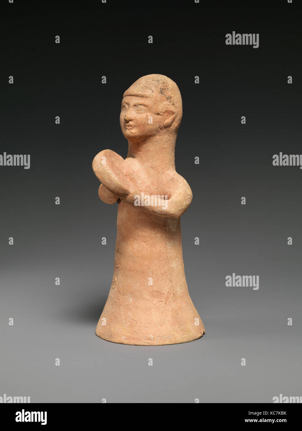 Terracotta female musician, Cypro-Archaic II, ca. 600–480 B.C., Cypriot, Terracotta; wheel-made, hand-made, and mold-made, H. 6 Stock Photo