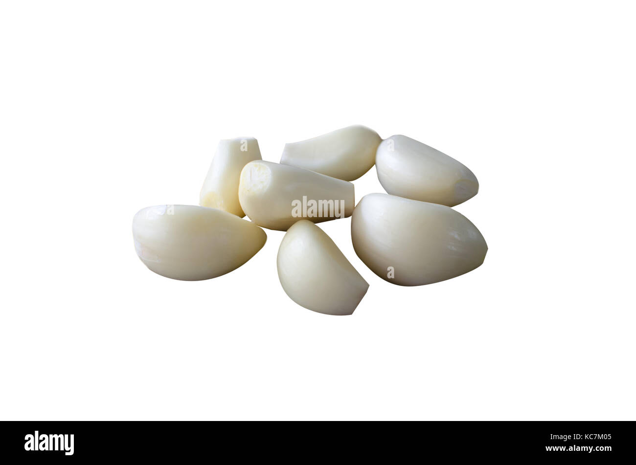 Peeled garlic isolated on white background Stock Photo - Alamy