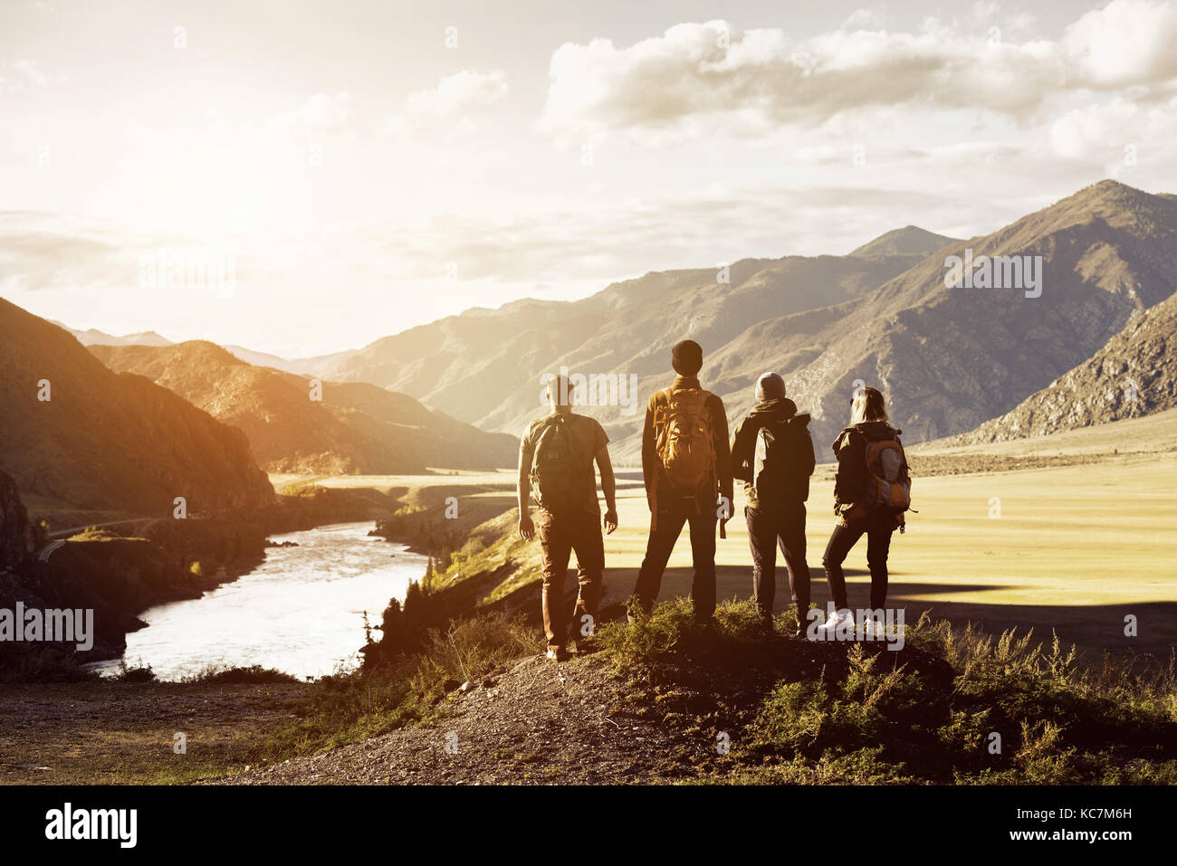 Group four people mountains travel concept Stock Photo