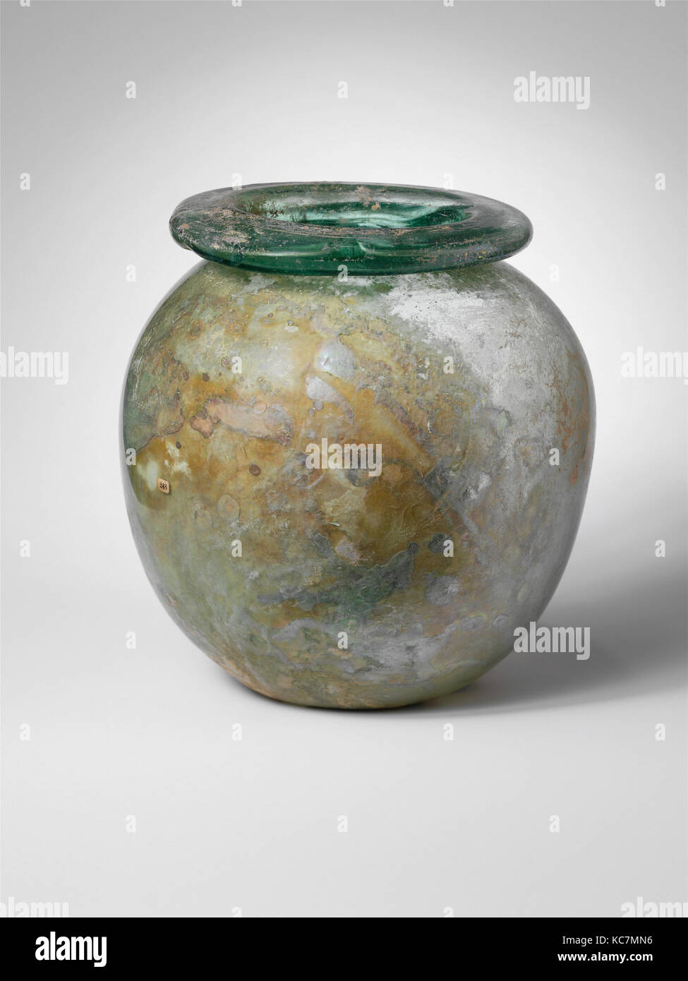 Glass jar, Imperial, mid-1st–2nd century A.D., Roman, Glass; blown, Overall: 9 1/4 in. (23.5 cm), Glass, Translucent blue green Stock Photo