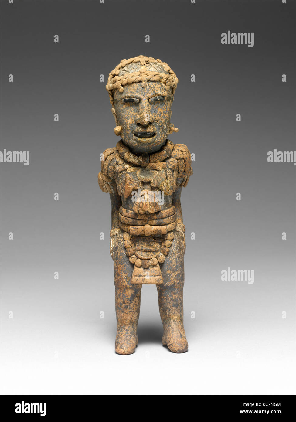 Figure, 7th–10th century, Mexico, Mesoamerica, Veracruz, Veracruz, Ceramic, hematite, H. 8 1/8 x W. 2 3/4 x D. 2 1/2 in. (20.6 Stock Photo