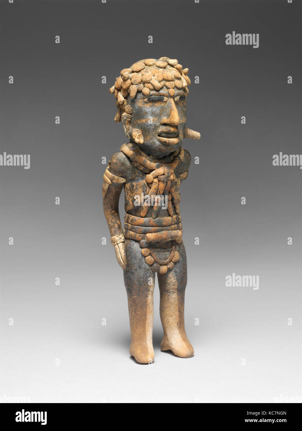 Figure, 7th–10th century, Mexico, Mesoamerica, Veracruz, Veracruz, Ceramic, H. 8 1/4 x W. 2 5/8 x D. 2 1/4 in. (21 x 6.7 x 5.7 Stock Photo